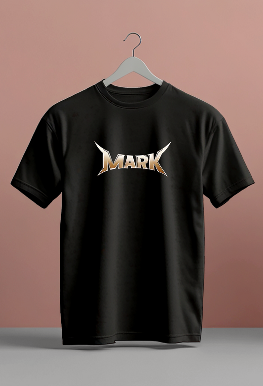 Black t-shirt with 'MARK' logo on front and colorful graphic on back against a pink background