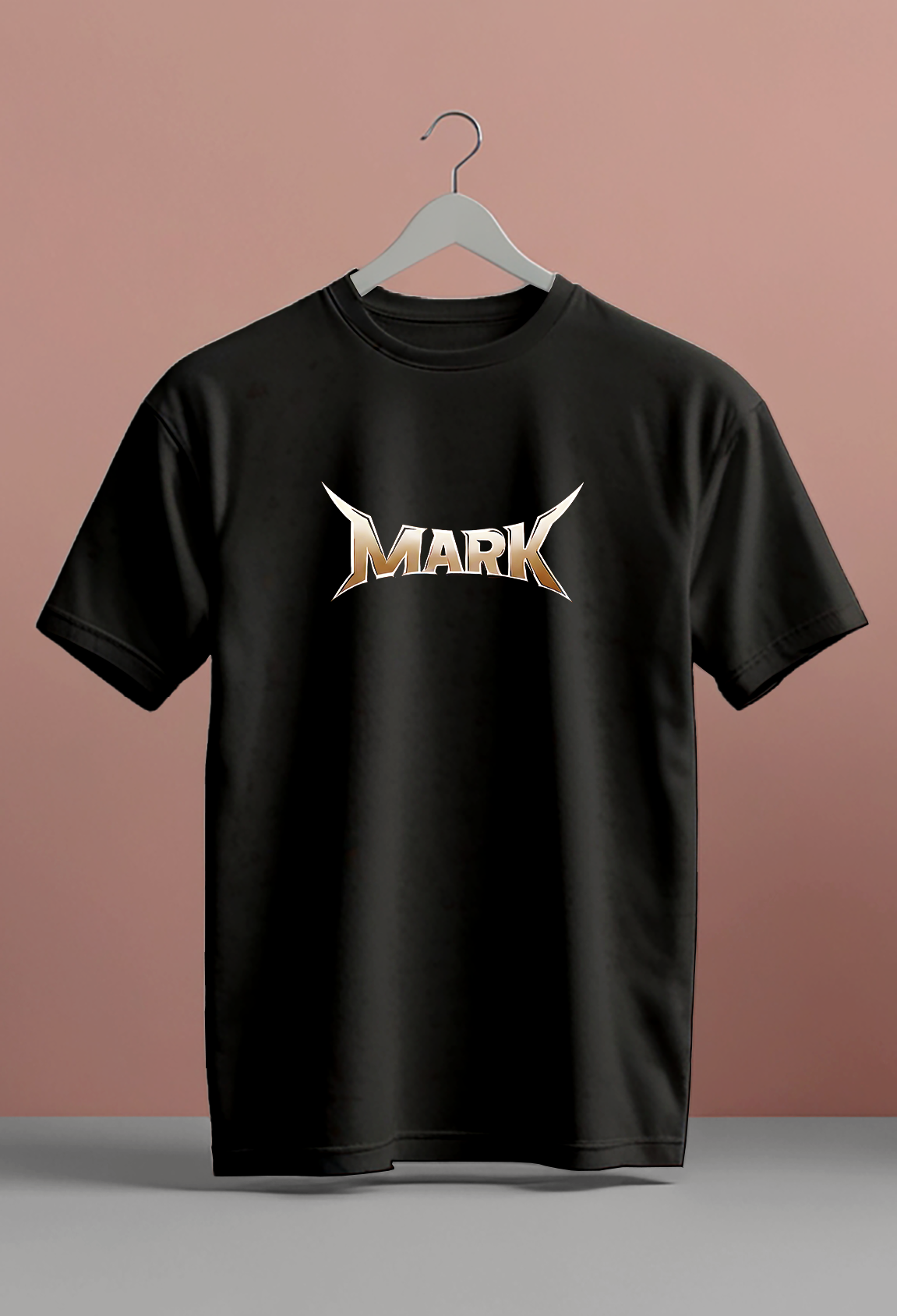 Black t-shirt with 'MARK' logo on front and colorful graphic on back against a pink background